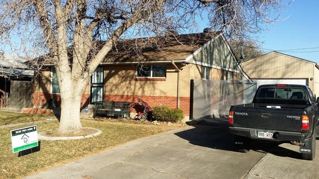The roof and gutters on this home in Denver, CO were in need of full replacement.